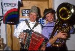 Jan Gisbers en Gerrie Kneteman als PR-medewerker voor de PDM wielerploeg 1990