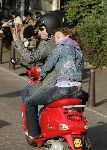 Amsterdam 5 oktober 2005
Thijs Romer met Katja Schuurman op Vespa scooter. Katja ligt lekker tegen zijn rug te slapen.