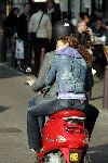 Amsterdam 5 oktober 2005
Thijs Romer met Katja Schuurman op Vespa scooter. Katja ligt lekker tegen zijn rug te slapen.