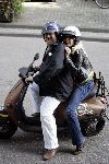 Amsterdam 5 oktober 2005
Henk Schiffmacher met Louise op Vespa scooter in Amsterdam