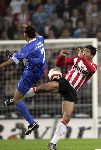 Eindhoven, 15 Oktober 2005
Kompetiewedstrijd Seizoen 2005/2006
PSV-AZ, eindstand 3-0
Kew Jaliens in een luchtduel met Michael Lamey
© foto Peter Smulders BV