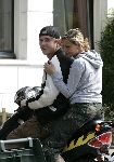 Amsterdam 3 september 2005
Johnny de Mol met zijn nieuwe vriendin op scooter