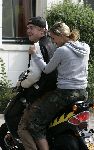Amsterdam 3 september 2005
Johnny de Mol met zijn nieuwe vriendin op scooter