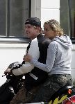 Amsterdam 3 september 2005
Johnny de Mol met zijn nieuwe vriendin op scooter