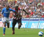 Eindhoven, 17 September 2006
Kompetitiewedstrijd PSV-Feyenoord, eindstand 2-1
Arouna Kone in duel met  Dwight Tiendalli van Feyenoord
© Foto Ronald Otter