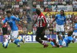 Eindhoven, 17 September 2006
Kompetitiewedstrijd PSV-Feyenoord, eindstand 2-1
Arouna Kone in duel met Dwight Tiendalli links Karim Saidi