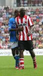 Eindhoven, 17 September 2006
Kompetitiewedstrijd PSV-Feyenoord, eindstand 2-1
Arouna Kone in duel met Dwight Tiendalli