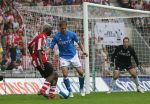Eindhoven, 17 September 2006
Kompetitiewedstrijd PSV-Feyenoord, eindstand 2-1
Arouna Kone in duel met Theo Lucius Rechts Henk timmer