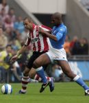 Eindhoven, 17 September 2006
Kompetitiewedstrijd PSV-Feyenoord, eindstand 2-1
Diego Tardelli zijn eerste wedstrijd voor PSV in duel met Andre Bahia