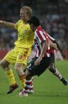 Eindhoven, 12 September 2006 PSV-FC Liverpool. 1e wedstrijd in de Champions League Seizoen 2006/2007 eindstand 0-0
Dirk Kuyt in zijn eerste CL wedstrijd voor FC Liverpool in duel met Carlos Salcido