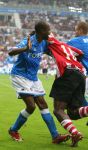 Eindhoven, 17 September 2006
Kompetitiewedstrijd PSV-Feyenoord, eindstand 2-1
Dwight Tiendalli probeert Arouna Kone van de bal te houden