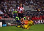 Eindhoven,12 September 2006
Champions League wedstrijd PSV-FC Liverpool
Jan Kromkamp in duel met Stephen Warnock