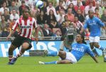 Eindhoven, 17 September 2006
Kompetitiewedstrijd PSV-Feyenoord, eindstand 2-1
Jefferson Farfan in duel met Serginho Greene
© Foto Ronald Otter