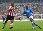 Eindhoven, 17 September 2006
Kompetitiewedstrijd PSV-Feyenoord, eindstand 2-1
Jefferson Farfan in duel met Andre Bahia