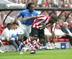 Eindhoven, 17 September 2006
Kompetitiewedstrijd PSV-Feyenoord, eindstand 2-1
Jefferson Farfan in duel met Serginho Greene.