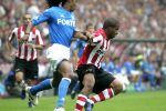 Eindhoven, 17 September 2006
Kompetitiewedstrijd PSV-Feyenoord, eindstand 2-1
Jefferson Farfan in duel met Serginho Greene.