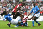 Eindhoven, 17 September 2006
Kompetitiewedstrijd PSV-Feyenoord, eindstand 2-1
Jefferson Farfan en Arouna Kone in duel met Serginho Greene en Dwight Tiendalli