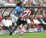 Eindhoven, 17 September 2006
Kompetitiewedstrijd PSV-Feyenoord, eindstand 2-1
Serginho Green in duel met Jefferson Farfan