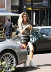 Amsterdam 25 augustus 2011
Danielle Overgaag doet boodschappen op de cornelis schuytstraat met haar porsche 911 cabrio.
Peter Smulders bv