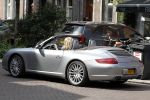 Amsterdam 25 augustus 2011
Danielle Overgaag doet boodschappen op de cornelis schuytstraat met haar porsche 911 cabrio.
Peter Smulders bv