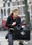 Amsterdam 26 augustus 2011
Lauren Verster in de regen op de fiets.
Peter Smulders bv