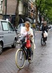 Amsterdam 31 augustus 2013
Ruud en Aafke de Wild met hun kinderen boodschappen aan het doen op de fiets.
