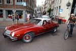 Amsterdam 6 september 2013
Ben Saunders met een vriend in zijn chevrolet Camaro uit 1977 op de grachten van Amsterdam