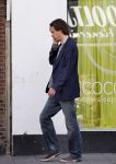 Amsterdam 26 augustus 2013
Hans Teeuwen bellend op straat.
Peter Smulders bv