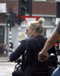 Amsterdam 21 augustus 2013
Lieke v Lexmond samen met haar manager Frank Wisse op vespa scooter.
Peter Smulders bv