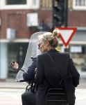 Amsterdam 21 augustus 2013
Lieke v Lexmond samen met haar manager Frank Wisse op vespa scooter.
Peter Smulders bv