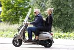 Amsterdam 21 augustus 2013
Lieke v Lexmond samen met haar manager Frank Wisse op vespa scooter.
Peter Smulders bv