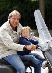 Amsterdam 31 augustus 2013
Patrick Huisman met zoontje op vespa scooter