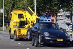 Amsterdam 19 augustus 2013
Ruud Gullit zijn porsche 911 cabrio wordt weg gesleept . Zijn auto vond stoor het appartement waar hij nu woont.
Peter Smulders bv