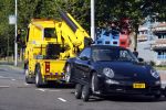 Amsterdam 19 augustus 2013
Ruud Gullit zijn porsche 911 cabrio wordt weg gesleept . Zijn auto vond stoor het appartement waar hij nu woont.
Peter Smulders bv