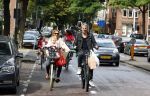 Amsterdam 31 augustus 2013
Ruud en Aafke de Wild met hun kinderen boodschappen aan het doen op de fiets.