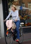 Amsterdam 25 augustus 2013
Tjitske Reidinga op de fiets in Amsterdam.
Peter Smulders bv