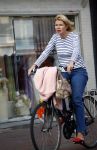 Amsterdam 25 augustus 2013
Tjitske Reidinga op de fiets in Amsterdam.
Peter Smulders bv