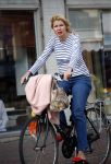 Amsterdam 25 augustus 2013
Tjitske Reidinga op de fiets in Amsterdam.
Peter Smulders bv
