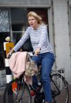 Amsterdam 25 augustus 2013
Tjitske Reidinga op de fiets in Amsterdam.
Peter Smulders bv