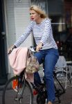 Amsterdam 25 augustus 2013
Tjitske Reidinga op de fiets in Amsterdam.
Peter Smulders bv