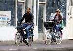 Amsterdam 1 september 2015 
Danny landzaat met vrouw en kinderen op de fiets in Amsterdam.