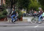 Amsterdam 1 september 2015 
Danny landzaat met vrouw en kinderen op de fiets in Amsterdam.