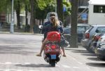 Amsterdam 26 augustus 2015 
Martijn Krabbe met dochter Jasmijn op zijn vespa scooter