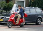 Amsterdam 26 augustus 2015 
Martijn Krabbe met dochter Jasmijn op zijn vespa scooter