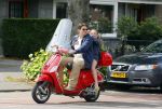 Amsterdam 26 augustus 2015 
Martijn Krabbe met dochter Jasmijn op zijn vespa scooter