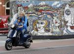 Amsterdam 2 september 2016 
Hans Jorritsma met zijn zoon op een vespa scooter