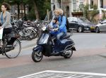 Amsterdam 2 september 2016 
Hans Jorritsma met zijn zoon op een vespa scooter