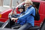 Amsterdam 2 september 2016 
Hans Jorritsma met zijn zoon op een vespa scooter