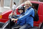 Amsterdam 2 september 2016 
Hans Jorritsma met zijn zoon op een vespa scooter