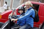 Amsterdam 2 september 2016 
Hans Jorritsma met zijn zoon op een vespa scooter
